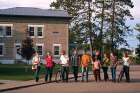 Students from Our Lady Seat of Wisdom Academy pass by St. Joseph Hall on the campus in Barry’s Bay, Ont.