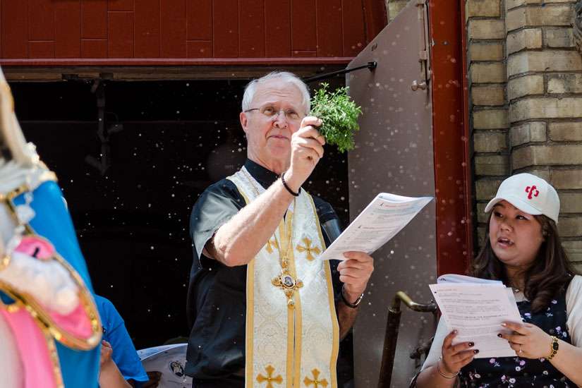 Bishop John Pazak giving a blessing in front of Our Lady of Mount Carmel Church in Toronto, May 29, 2016. the Holy Protection of Mary Byzantine Eparchy of Phoenix officially celebrated the enthronement of Bishop John S. Pazak on July 20.