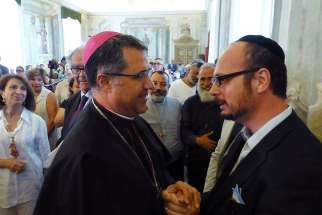 Palermo Archbishop Corrado Lorefice, left, meets Rabbi Pinhas Punturello, Shavei Israel’s emissary to Sicily, Italy.