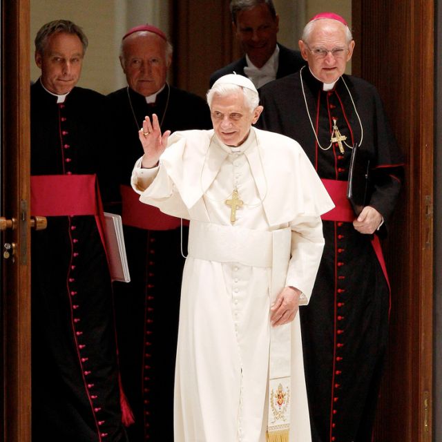 Pope Benedict XVI waves as he arrives to lead his weekly general audience in Paul VI hall at the Vatican June 13. 