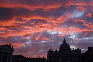 St. Peter&#039;s Basilica is seen during sunset in Rome in this Oct. 20, 2011, file photo. Pope Francis has approved revised norms for the Congregation for Saints&#039; Causes regarding medical consultations on healings alleged to be miracles.