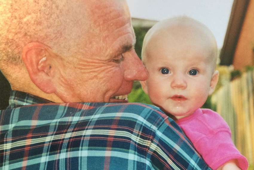 Baby Abigail with her grandfather. 