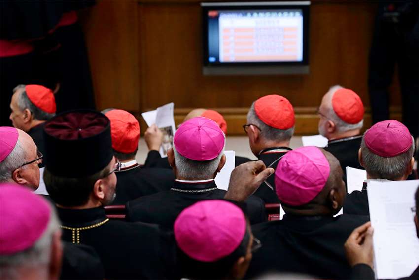 Prelates attend the opening session of the meeting on the protection of minors in the church at the Vatican Feb. 21, 2019.