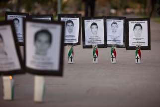 Images of college students who went missing in November 2014 in Guerrero, Mexico. The Archdiocese of Guadalajara is closing its missing person registry out of fear of retaliation by organized crime against family members of those missing.