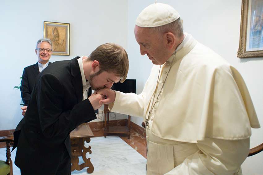 Tom Evans, father of the seriously ill child Alfie Evans, kisses Pope Francis&#039; hand during a private audience in the Domus Sanctae Marthae at the Vatican April 18. Evans pleaded for &quot;asylum&quot; for his son in Italy so he may receive care and not be euthanized in England. Italy granted asylum April 23.