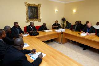 African cardinals and bishops participating in the Synod of Bishops on the family gather for a meeting in Rome Oct. 7.