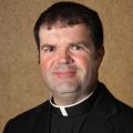 Father Scott Carroll, 46, lost his battle with cancer May 10, just two days after Bishop Leonard P. Blair of Toledo, Ohio, ordained him a priest at the family home in Maumee. Father Carroll is pictured in a 2012 photo. 