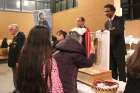 Young and old venerate the arm relic of St. Francis of Xavier in Mississauga on Jan. 13. 