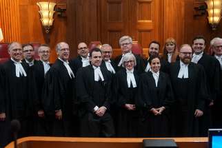 Trinity Western lawyers and interveners pose in front of the bench at the Supreme Court of Canada after the Nov. 30-Dec.1 hearings in this important religious freedom case.