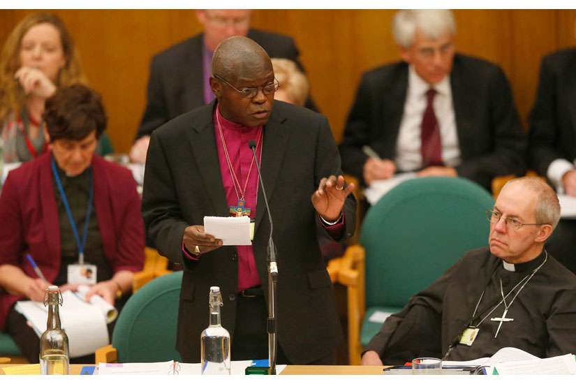 On Jan. 26, Anglican archbishop of York John Sentamu laid hands on the Rev. Libby Lane in an ordination ceremony. In this photo, Sentamu speaks as Archbishop Justin Welby of Canterbury, the leader of the worldwide Anglican Communion looks on during the Church of England&#039;s General Synod at Church House in central London Nov. 20. The Church of England&#039;s law-making body voted in favour of female bishops that day, a move that ended a 20-year impasse and could see women ordained as senior clergy.