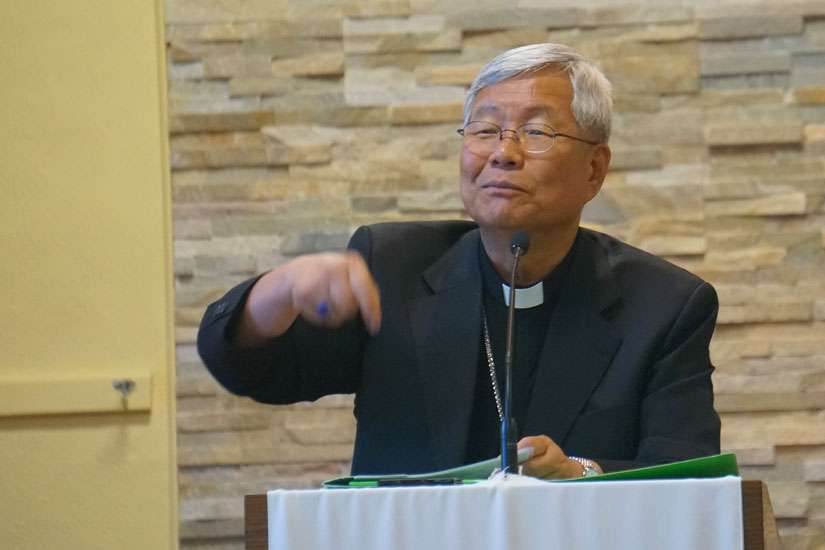 Daejeon Bishop Lazzaro You talks to parishioners at Holy Korean Martyrs in Ottawa July 15.