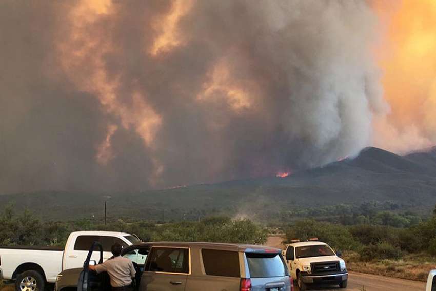Smoke rises from the Goodwin Fire in the Prescott National Forest near Mayer, Ariz., June 29.