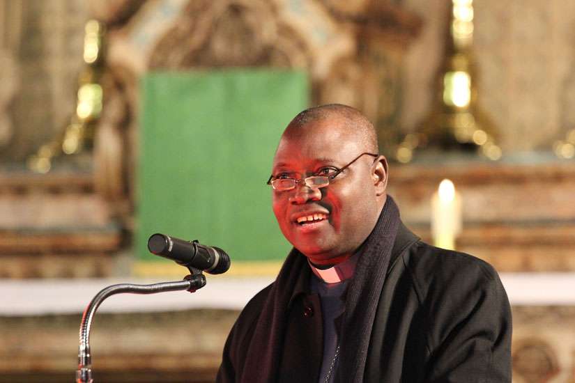 Archbishop Ignatius Kaigama of Jos, Nigeria, president of the Nigerian bishops&#039; conference, speaks in Manchester, England, Nov. 6 on his country&#039;s Ebola efforts and contrasting with its lack of aggression in addressing Islamic extremism.