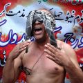 A Pakistani Christian man beats his chest while taking part in a Nov. 28 protest in Lahore against a NATO cross-border attack. Catholics joined protests against the U.S. drone attack that killed 24 Pakistani soldiers.