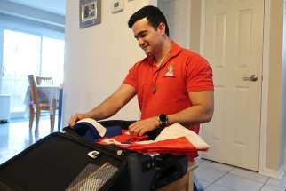 José Murillo packs his bag as he gets ready for his first World Youth Day in Panama City. 