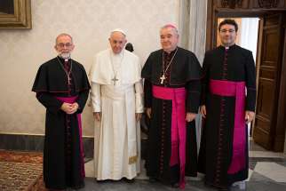  Pope Francis poses for a photo with representatives of the Canadian Conference of Catholic Bishops during a meeting at the Vatican Dec. 6. From left are Bishop Lionel Gendron of Saint-Jean-Longueuil, Quebec, CCCB president; Pope Francis; Archbishop Richard Gagnon of Winnipeg, Manitoba, CCCB vice president; and Msgr. Frank Leo Jr., general secretary of the conference.