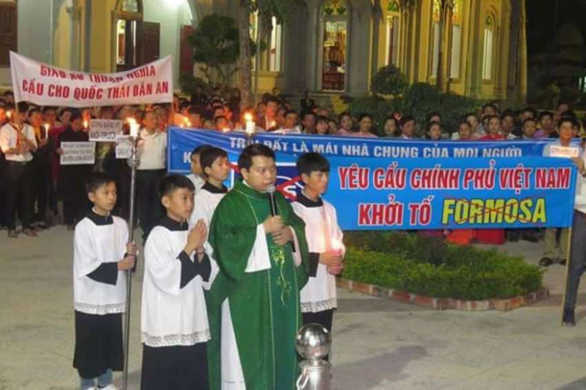 Song Ngoc Parish gather to pray for parishioners who were beaten by police by police while attempting to file a lawsuit Feb. 19. 11 of the parish&#039;s priest said in a June 13 petition that the local authorities have looked the other way as groups of youths have terrorized the community.