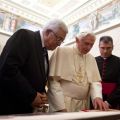 Pope Benedict XVI exchanges gifts with Palestine&#039;s President Mahmoud Abbas during a private audience in the pontiff&#039;s library at the Vatican Dec. 17. A statement from the Vatican press office said the two leaders discussed the need to restart talks betwe en the Israelis and Palestinians.