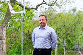 Neil McNeil high school teacher Joe Ferro hopes exposing his students to renewable energy technology today will lead to a brighter future tomorrow. Ferro created and installed the wind turbine and the students added the school logo to the tail fin.