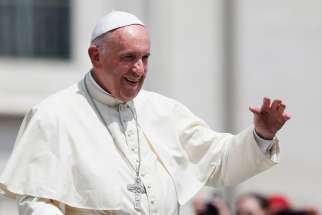 Pope Francis waves as he leaves his general audience in St. Peter&#039;s Square at the Vatican June 8.