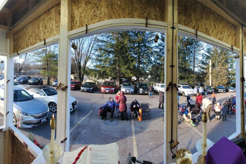 The view from inside “Fr. Gerard’s COVID Shack” where Fr. Gerard Monaghan presides over Sunday drive-in Masses at St. Faustina Church in Cumberland, Ont.