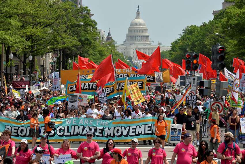 Demonstrators join the People&#039;s Climate March in Washington to protest President Donald Trump&#039;s stance on the environment April 29.