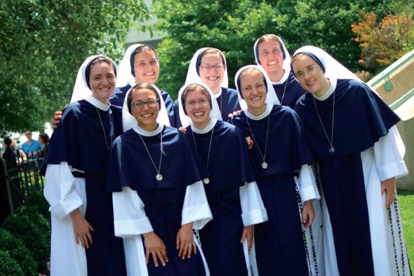 Sr. Monica Marie Currie, second from right in back row, was one of eight women who made their final vows as Sisters of Life last month. 