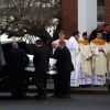 The casket of Jessica Rekos is placed in a hearse following her funeral Mass at St. Rose of Lima Church in Newtown, Conn., Dec. 18. Mourners packed back-to-back services at the church that day for Jessica and James Mattioli, two of the 20 young victims o f the Newtown shooting massacre.