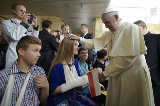 Pope Francis blesses children during a visit to the Children&#039;s University Hospital in Krakow, Poland, July 29.