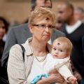 woman and child, marked with a cross of ashes, attend Ash Wednesday Mass at the Cathedral of Our Lady of the Angels in Los Angeles Feb. 22.