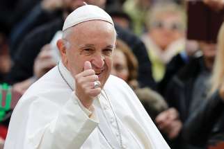 Pope Francis gives the thumbs up as he arrives to lead his general audience in St. Peter&#039;s Square at the Vatican Oct. 31. 