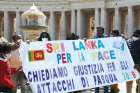 Sri Lankans living in Italy hold a sign calling for justice for the 2019 Easter bombings in Sri Lanka in St. Peter’s Square April 25.