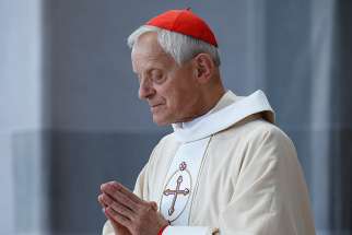 Cardinal Donald W. Wuerl of Washington is pictured as Pope Francis celebrates Mass in Washington Sept. 23, 2015. 
