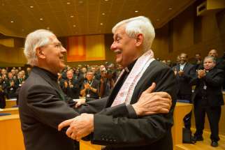 Jesuit Father Arturo Sosa, right, the new superior general of the Society of Jesus, greets the previous superior general, Jesuit Father Adolfo Nicolas, after his election in Rome Oct. 14. Father Sosa, 67, is a member of the Jesuits&#039; Venezuelan province.