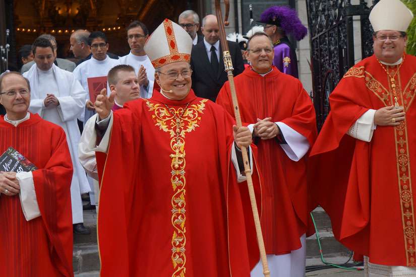 Cardinal Jaime Ortega of Havana waves after concelebrating Mass Sept. 14, 2014 at the Basilica-Cathedral Notre Dame de Quebec in Quebec City.