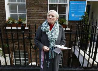 A woman prays the rosary in 2012 outside the Marie Stopes clinic in London. Members of Ealing Council, in the west of the capital, voted April 10 to establish a buffer zone around a Maria Stopes clinic, banning public prayer and offers of assistance to women within 100 meters of the building. 