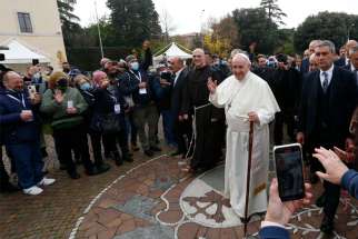 Pope Francis arrives for a meeting with the poor at the Basilica of St. Mary of the Angels in Assisi, Italy, Nov. 12, 2021. The visit was in preparation for the celebration of the World Day of the Poor.