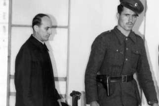 Blessed Alojzije Stepinac, left, enters a Zagreb courtroom in 1946. A commission of Croatian and Serbian experts studying Cardinal Stepinac&#039;s life said they were unable to reach a conclusion on questions regarding the controversial martyr&#039;s history.