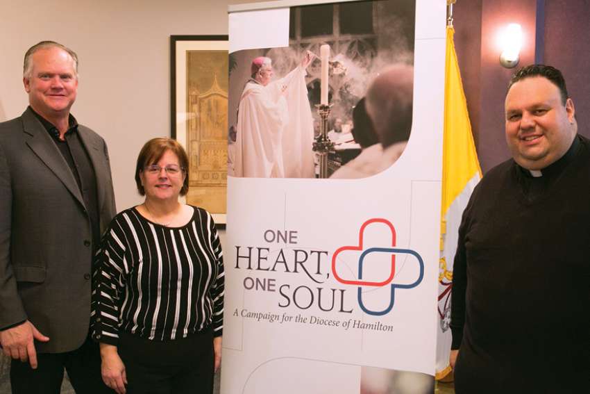 Blaine and Patti Field, here with Fr. Peter Ciallella at the diocesan kickoff event for the One Heart, One Soul Campaign, are the general chairs for the campaign at Blessed Sacrament in Burford, below.