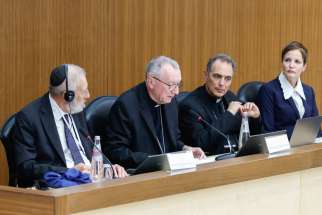 Panelists open the conference “New Documents from the Pontificate of Pope Pius XII” at the Pontifical Gregorian University in Rome, Oct. 9, 2023. From the left are Rome Chief Rabbi Riccardo Di Segni; Cardinal Pietro Parolin, Vatican secretary of state; Auxiliary Bishop Étienne Vetö of Reims, France, and Suzanne Brown-Fleming from the United States Holocaust Memorial Museum.