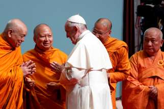 Pope Francis greets religious leaders during a meeting with Christian leaders and the leaders of other religions at Chulalongkorn University in Bangkok, Thailand, Nov. 22, 2019.