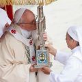 Pope Francis kisses the relics of St. Maria Guadalupe Garcia Zavala, also known as &quot;Madre Lupita,&quot; the Mexican co-founder of the Handmaids of St. Margaret Mary and the Poor, during her canonization Mass at the Vatican May 12.