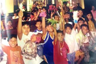 Last summer, Alisa Soropia gave out rosaries to local children during a mission trip to Iloilo, Philippines.