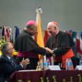 Brazilian Archbishop Orani Joao Tempesta of Rio de Janeiro shakes hands with Canadian Cardinal Marc Ouellet, prefect of the Congregation for Bishops, after he gave a presentation at a gathering of bishops and church leaders at the Basilica of Our Lady of Guadalupe in Mexico City Nov. 16. The leaders from the Americas met Nov. 16-19 to discuss the new evangelization in the Americas.