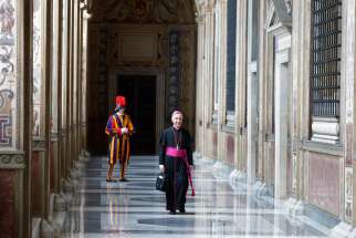Then-Archbishop Luis Ladaria, prefect of the Congregation for the Doctrine of the Faith, arrives for a meeting with Pope Francis in the Apostolic Palace at the Vatican in this May 11, 2018, file photo. On Feb. 14, 2022, Pope Francis split the Congregation for the Doctrine of the Faith into two main sections: doctrine and discipline.