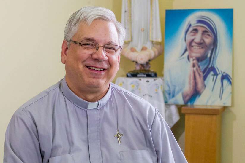 Father Brian Kolodiejchuk of the Missionaries of Charity Fathers, postulator for the cause of Blessed Teresa of Calcutta, poses for a photo at the Vatican Aug. 19.