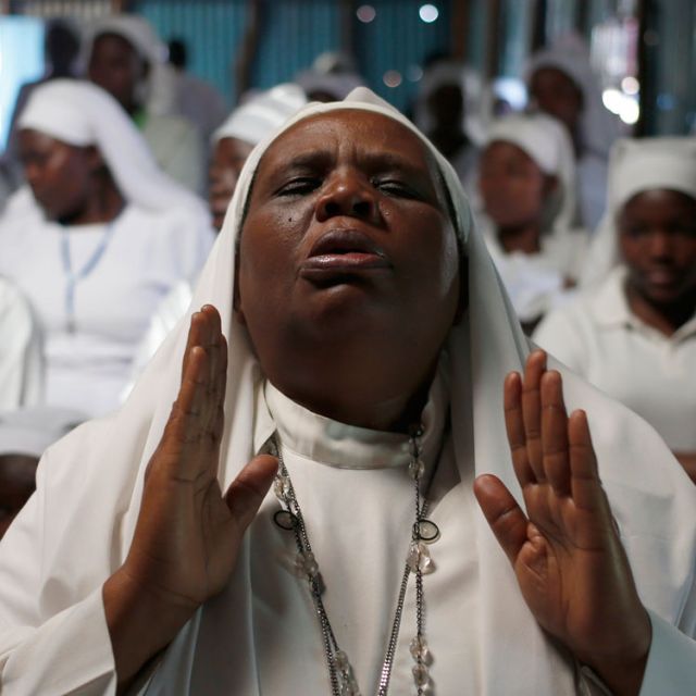 A woman prays during a service at a church in late September for victims of the attack by Somali&#039;s al-Shabaab militia group at the Westgate mall in Nairobi, Kenya. Bishop Giorgio Bertin of Djibouti, who also serves as apostolic administrator of Mogadishu , Somalia, said foreign intervention in the fight against al-Shabaab is necessary though not an absolute requirement.