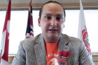 Cowessess First Nation Chief Cadmus Delorme announces the discovery of the unmarked graves in a videoconference June 24.