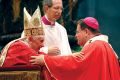 Archbishop Gerald Lacroix of Quebec, right, receives his pallium from Pope Benedict XVI in St. Peter’s Basilica at the Vatican in 2011. Less than three years later, Lacroix is being elevated to the College of Cardinals.