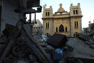 A damaged Syriac Catholic Church is pictured in Homs, Syria. Syriac Catholic bishops from around the world, meeting in Lebanon for their annual synod, lamented the plight of their &quot;tormented and persecuted&quot; faithful.